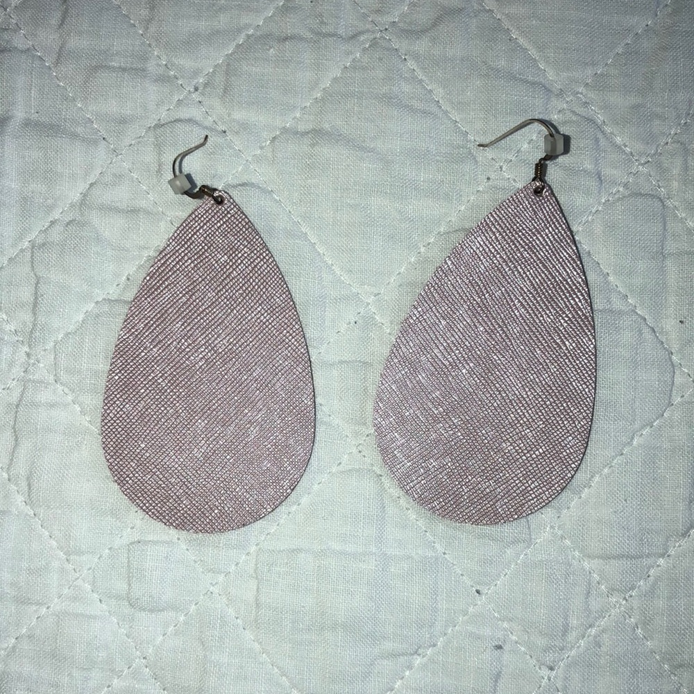 Nickel and Suede brand leather earrings